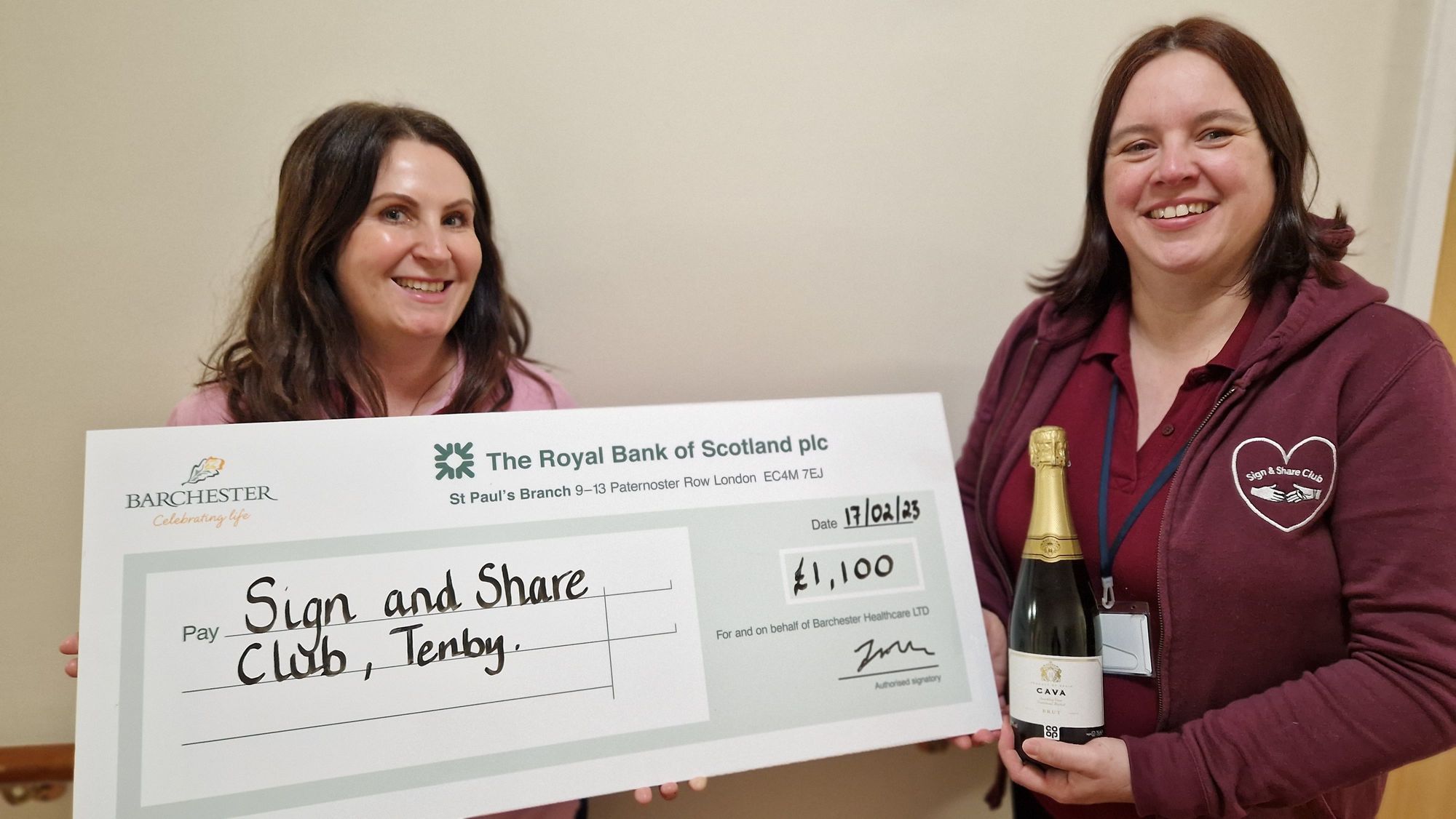 Carmarthen care home presents cheque to Pembrokeshire charity