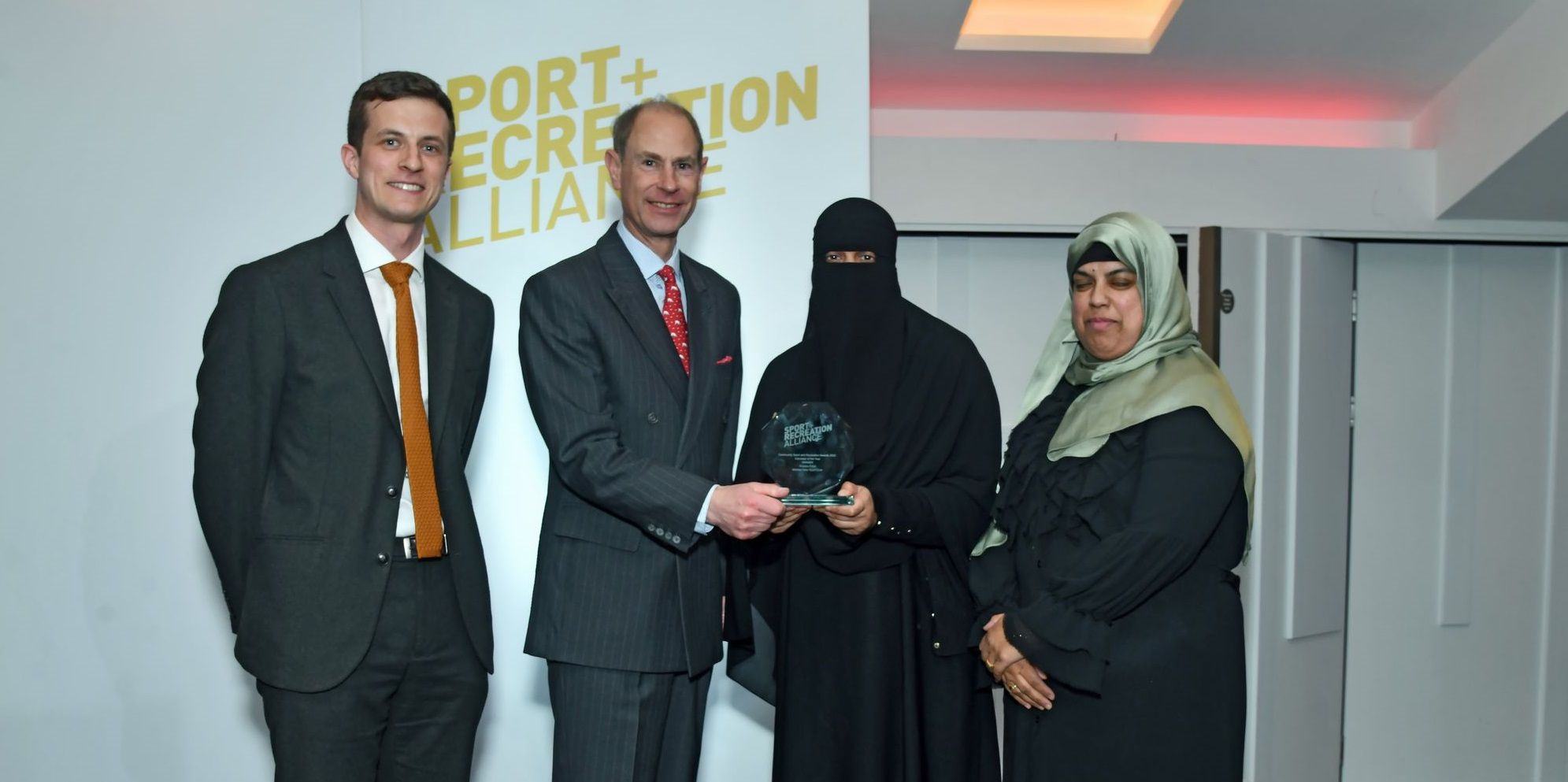 Grassroots youth club volunteer receives national award from Prince Edward