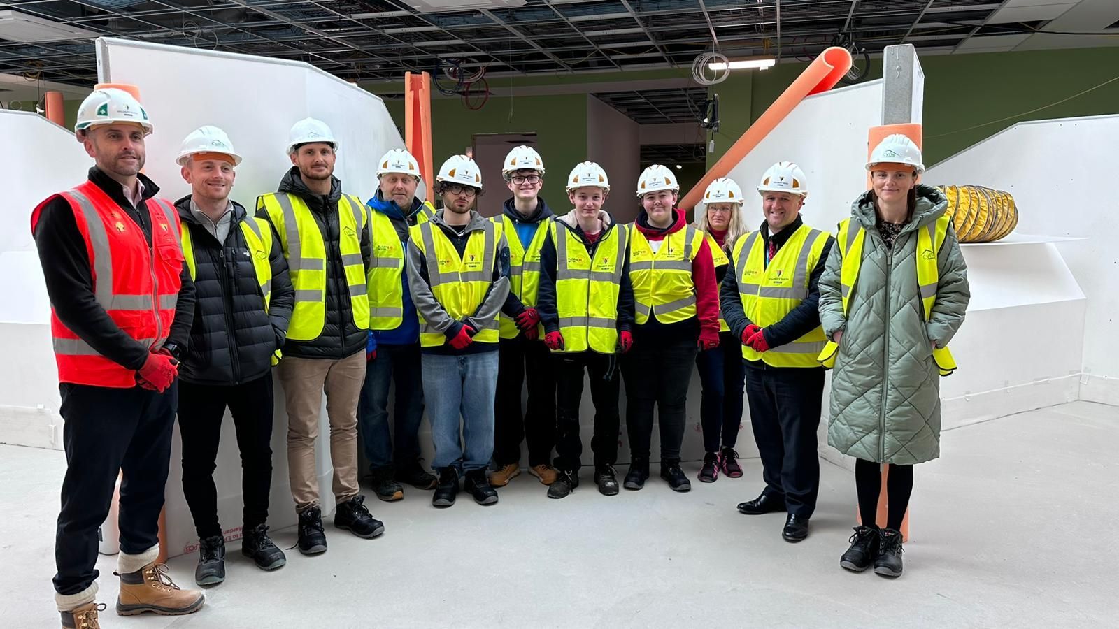 Police and crime commissioner joins students on tour of Dyfed-Powys Police custody suite construction
