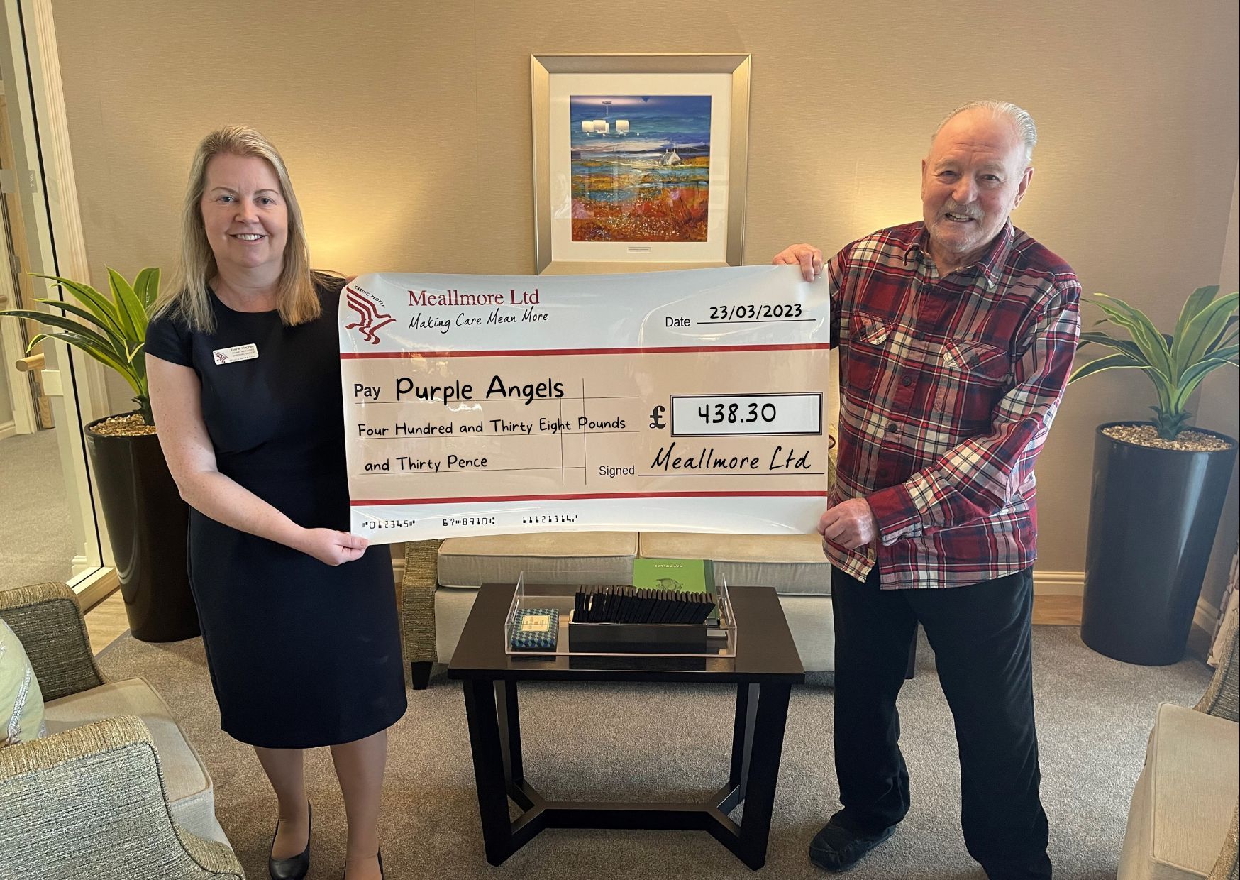 Ayr care home donates funds to dementia music charity