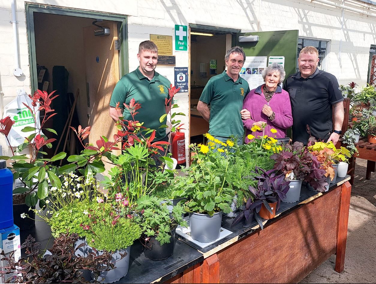 Norden resident picks out flowers for memorial garden
