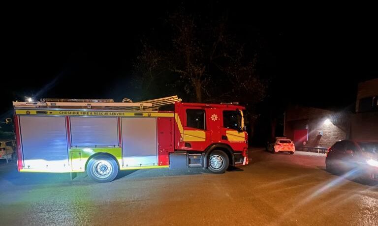 Man talked to safety from bridge in Runcorn