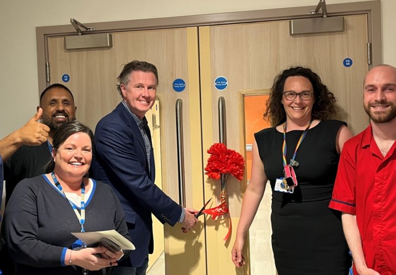 Football star cuts the ribbon at Stockport hospital's new cardiac suite