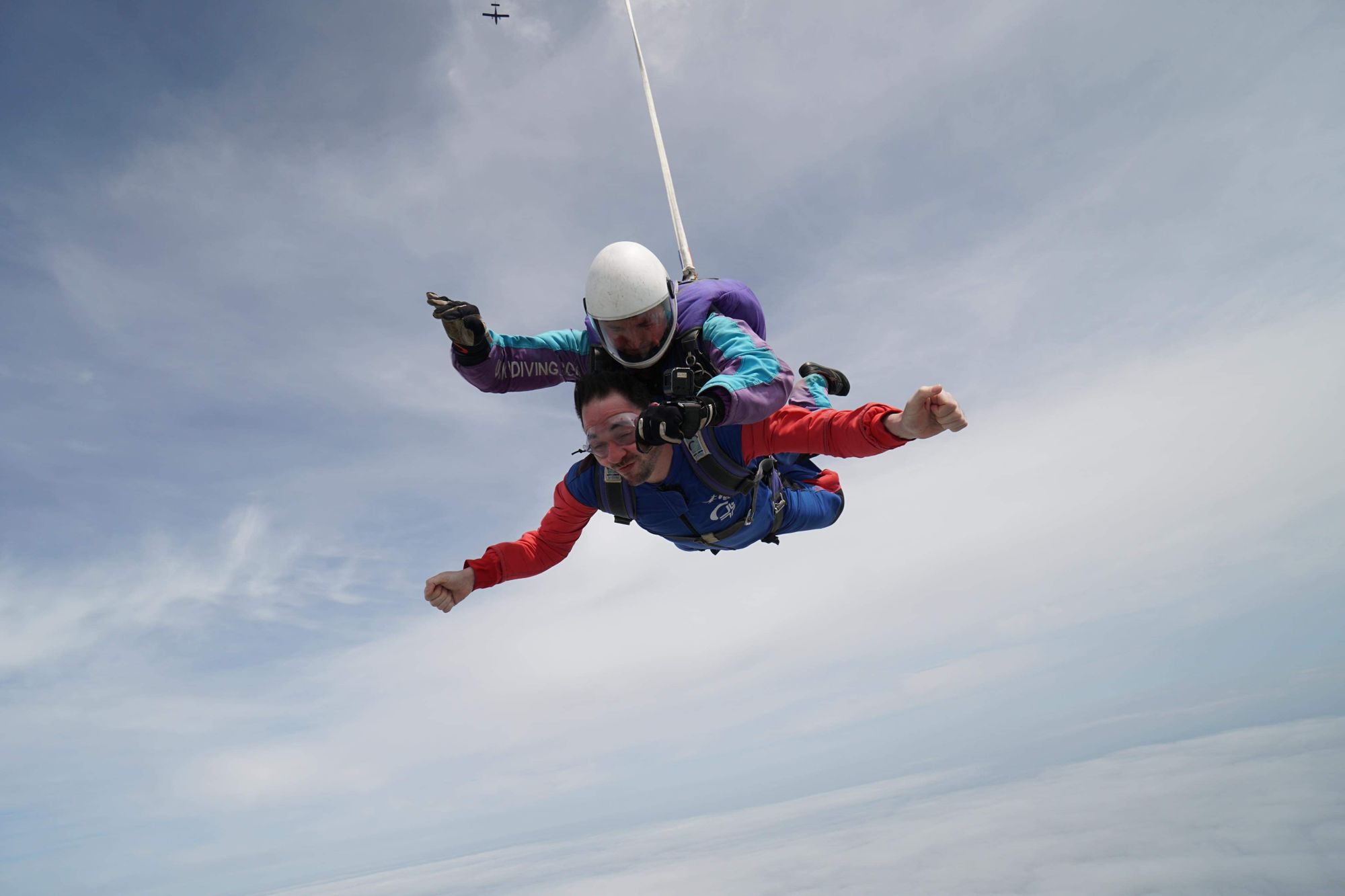 Lincolnshire daredevils jump 13,000ft to support children with brain tumours