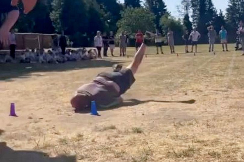 Grandad's spirited run at school sports day ends with a suspected fractured arm