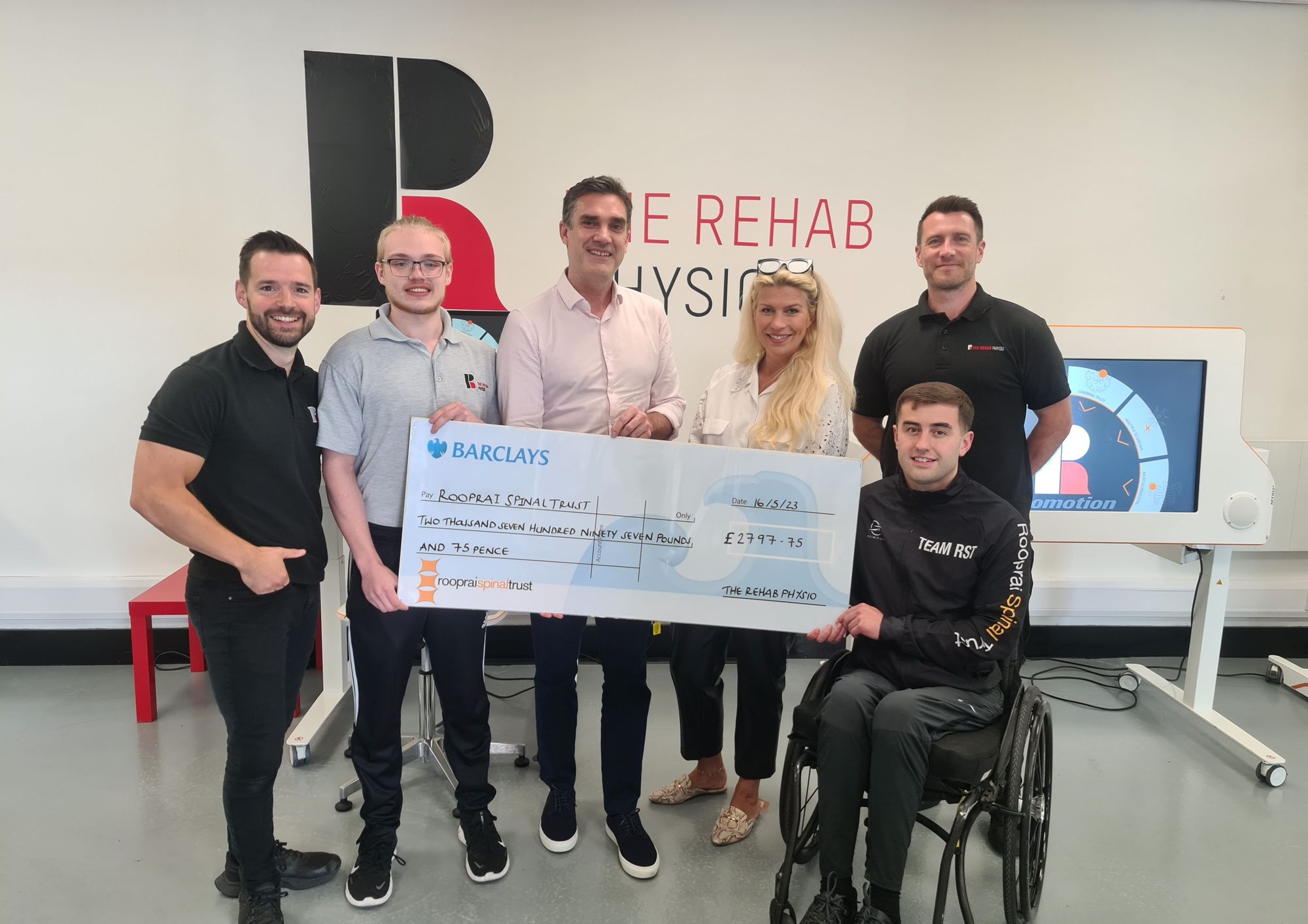 Prenton Park football fundraiser raises thousands to help people with spinal injuries