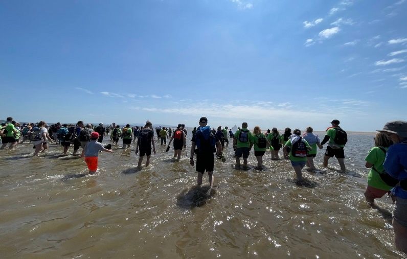 Supporters enjoy sunshine, sea and sand as thousands raised on annual walk