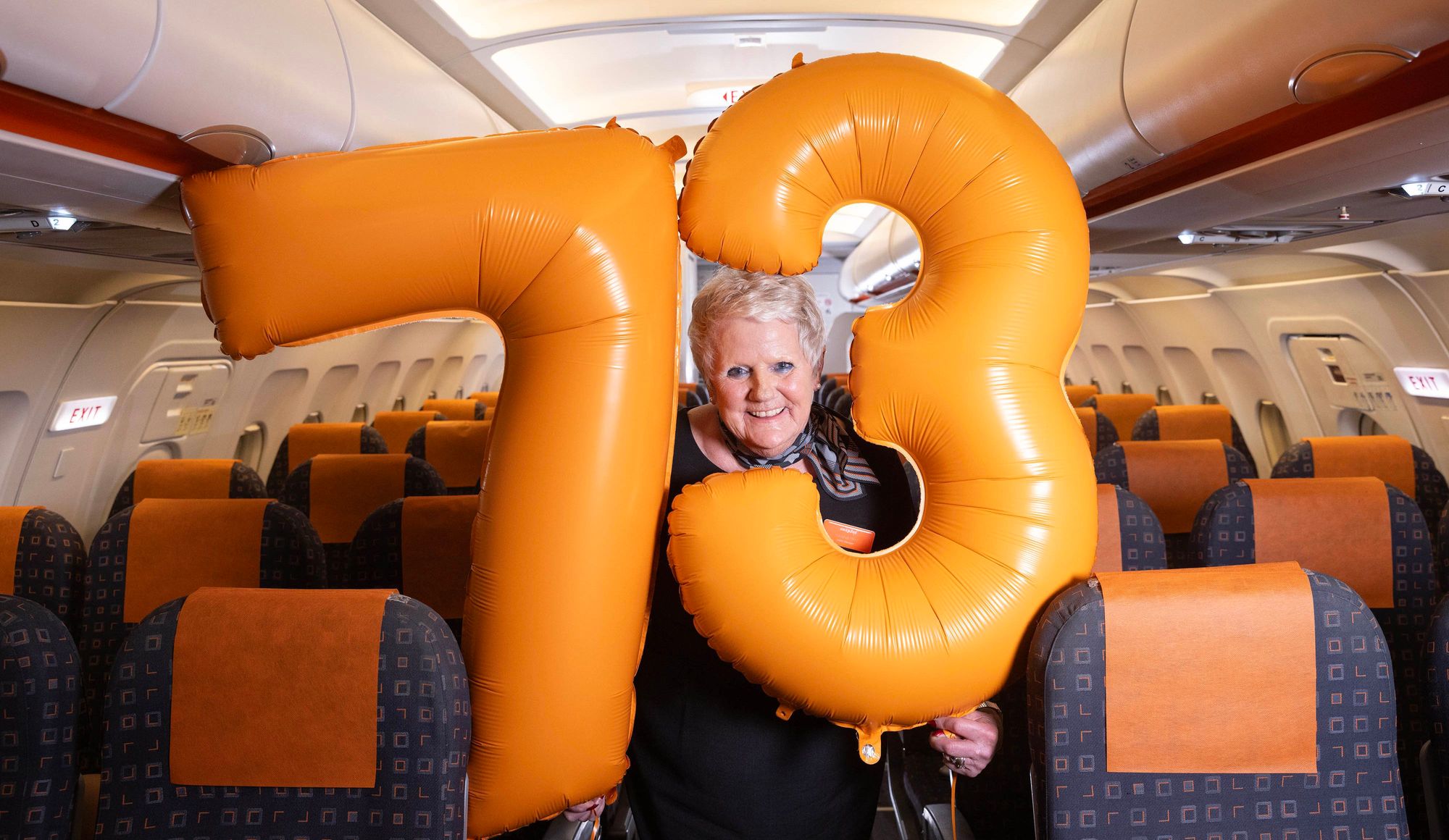 Nana Pam feels 'proud' to work as one of UK's oldest flight attendants