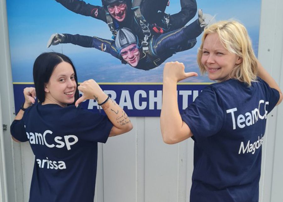 Cambridge nursery staff skydive to support children recovering from trauma
