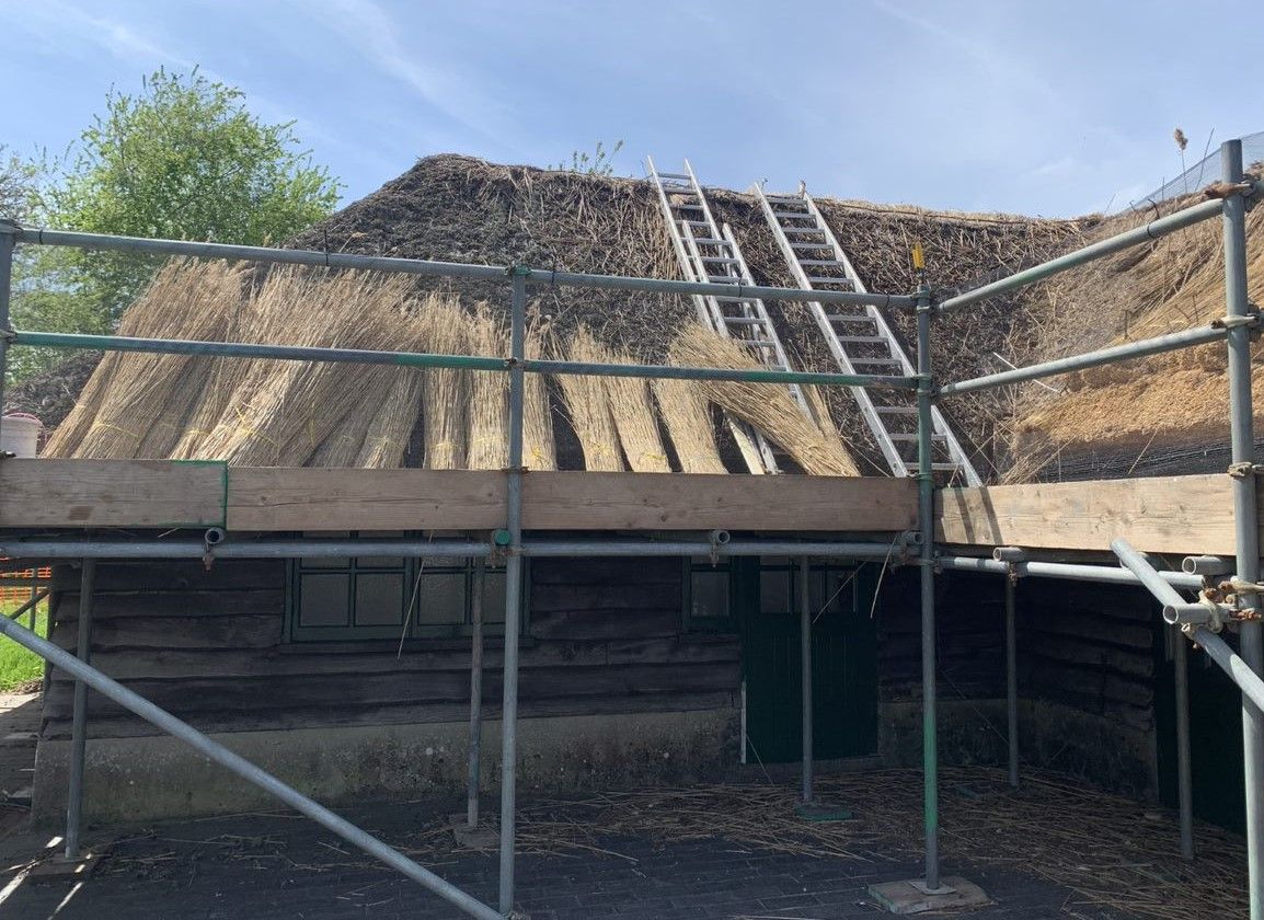 Rare roof thatching interests visitors at Barrington Court café
