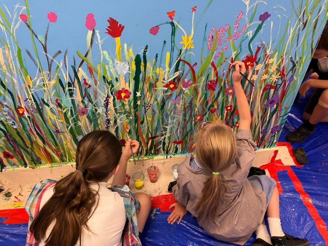 Young artists help create 'amazing' meadow mural at academy hub in Bath