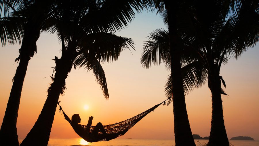 913998 reading on holiday 495960906 getty