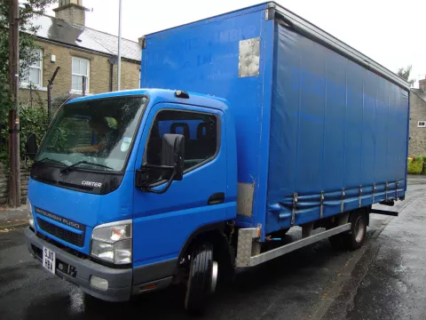 2010 Mitsubishi Canter Curtain Side img