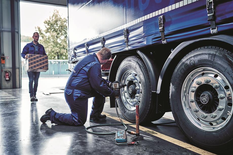 mechanic working on trailer