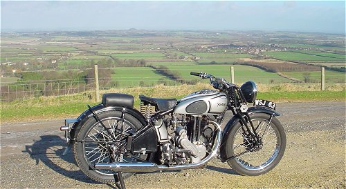 This is either a 1935 ES2, a 1942 WD 16H or a 1947 Big 4... I think it's the ES2. Nice view, too.