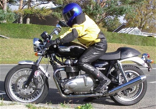 Yellow Peril Biker Babe assumes the position