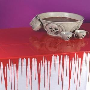 Hey! Stop bleeding on the tablecloth !!