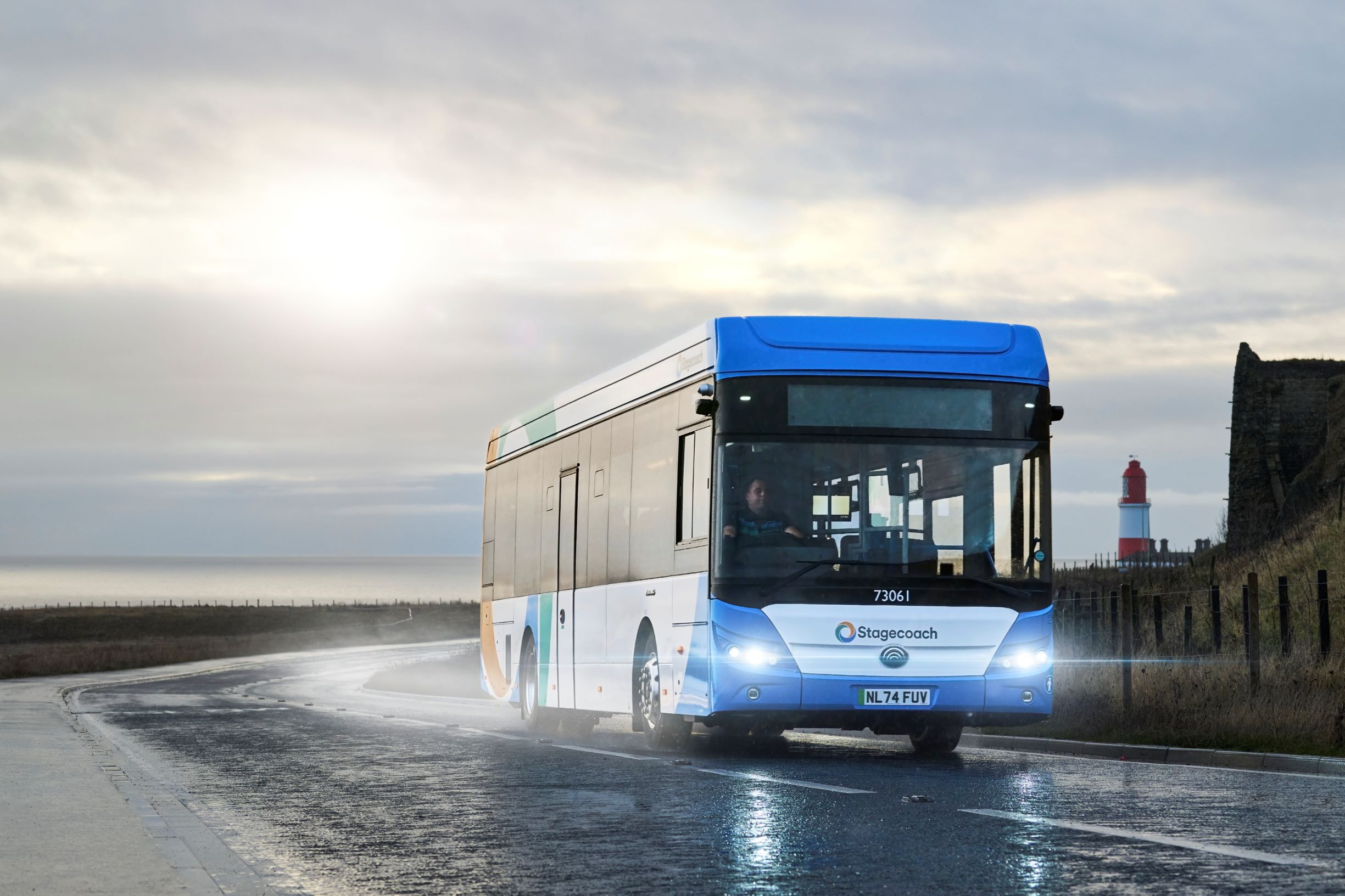 Electric Bus on the Coast Road heading north to South Shields passing Souter Lighthouse, 