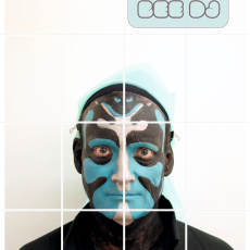 Face covered in blue black and white face paint art