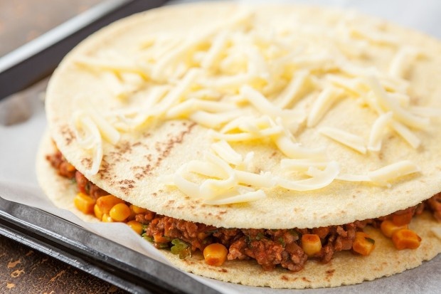 Gefüllte Tortillas mit rassigem Hackfleisch
