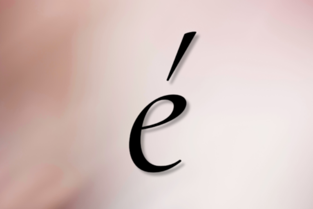 The letter é