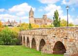 Getty Images 672918782 Beautiful view of the historic city of Salamanca with New Cathedral and Roman bridge Castilla y Leon region Spain min