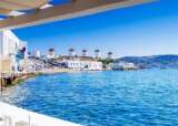 Mykonos greece windmills from restaurant