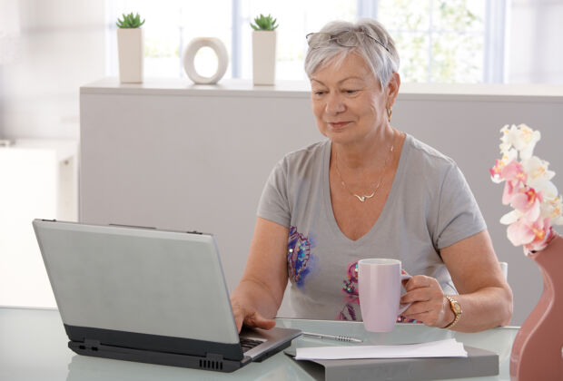 Photo of Online Obituaries Lady Laptop for panel