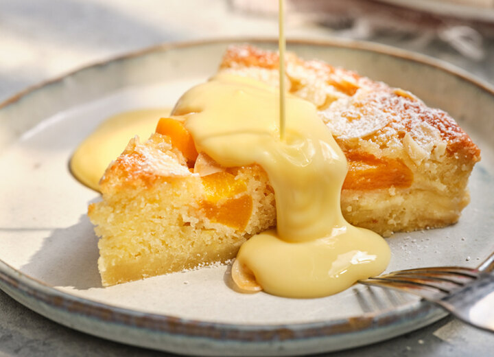 Peach tart slice and custard
