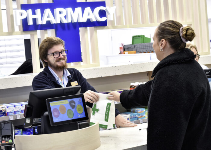 Patient collecting prescription