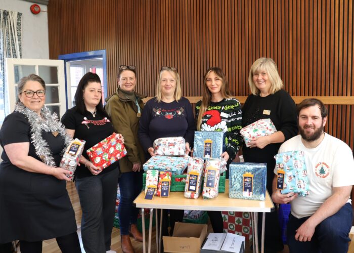 Secret Santa present wrapping volunteering