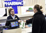 Patient collecting prescription