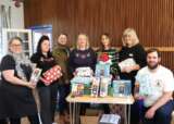 Secret Santa present wrapping volunteering