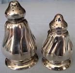 A pair of silver salt and pepper shakers. Austria?  76 grams. Marked: A 830. Up to 8 cm high.