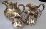 4 silver jugs. 422 grams total.  To 11.5 cm high. Up to 925 silver content. Handles filled?