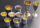 10 silver cups. Partly marked 84. Some Russian.  172 grams. Up to 9 cm high. In used condition.