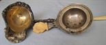 Ladle and strainer probably silver, with bone handles. 238 grams gross.  43 cm long. No Hallmarks