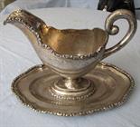 Gravy boat with Diana hallmark.  739 gramms gross. 24,5 cm lang.    Reserve price: 160    Sauciere