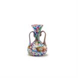 Toso, Fratelli, Murano  Henkelvase 'Murrine', um 1910  H. 11,2 cm. Farbloses Glas, aufgeschmolzene