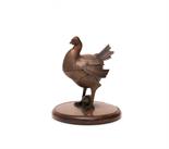 Winhart & Co., München  Eierkocher 'Huhn', 1896  H. 23,5 cm. Kupferblech, Holzsockel.   Ausst.-