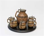 Reinhold Merkelbach, Grenzhausen   Bierservice mit Tablett, 1903  Acht Teile. Kanne, H. 30 cm;