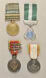 Ethiopia  Estade of a Korea war soldier.  1.) Patriot medal, with 4 palm sheet; 2.) underground