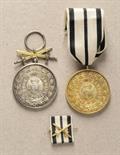 Hohenzollern  Lot of 2 medals of the ducal houseorder of Hohenzollern.  1.) Golden Medal; 2.) Silver