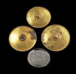 Three gold phalerae, slightly konvex, with differently decorated upper side. One with emeralds (some