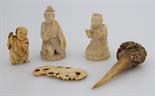 A parcel lot of ivories to include two late 19th Century Indian carvings of kneeling worshippers,