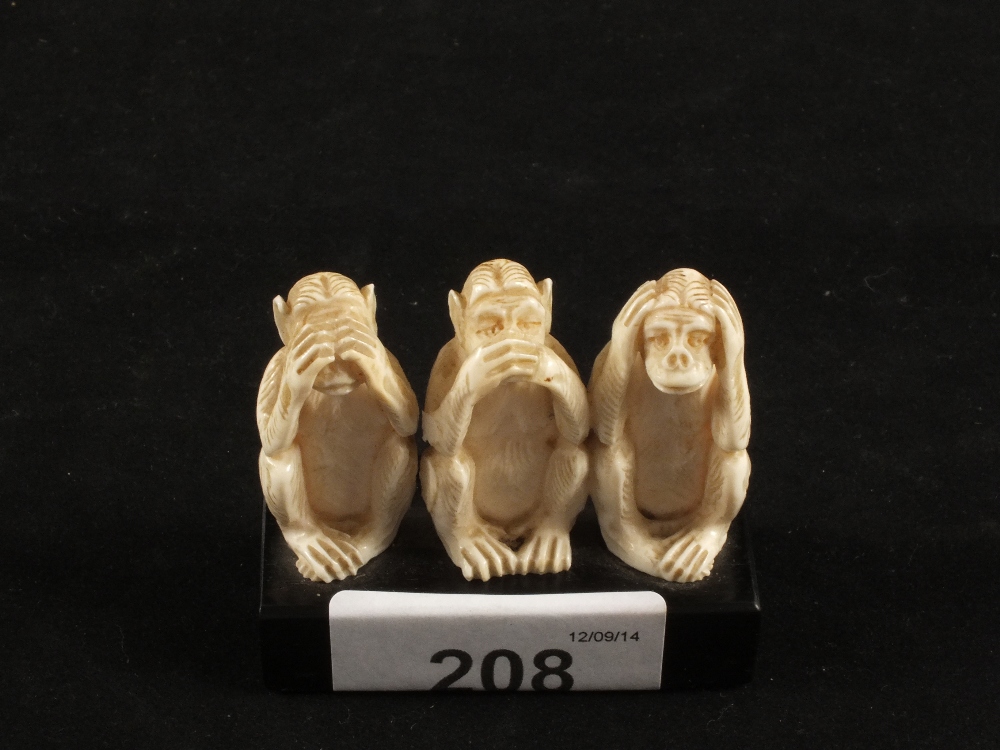 An Ivory carving of three monkeys, See No Evil, Hear No Evil and Speak