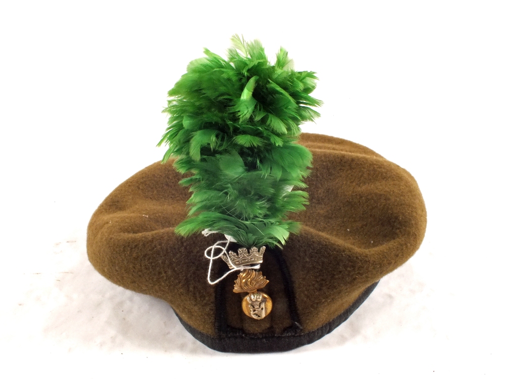 A beret (Caubeen) with badge and hackle to the Royal Irish Fusiliers