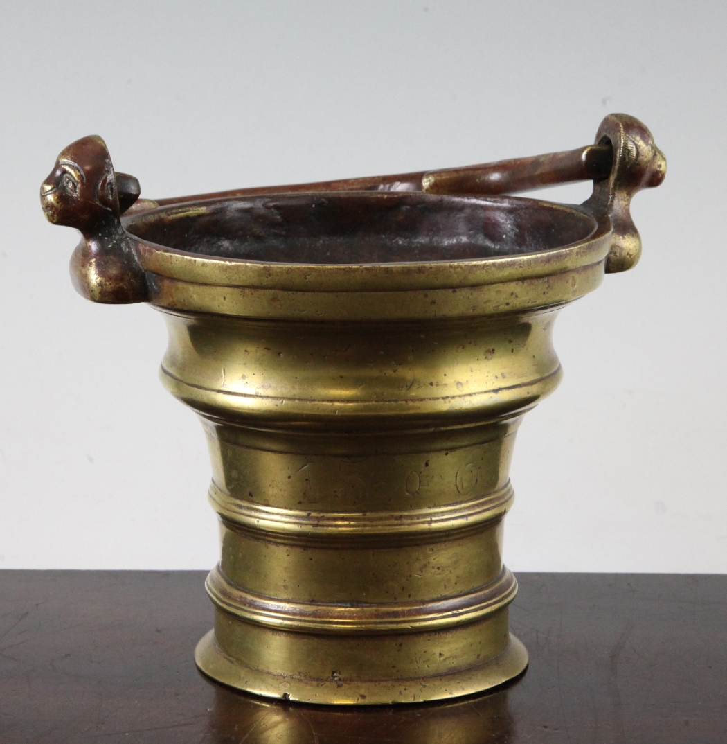 A 15th century German or Flemish brass Holy Water bucket, with a swing