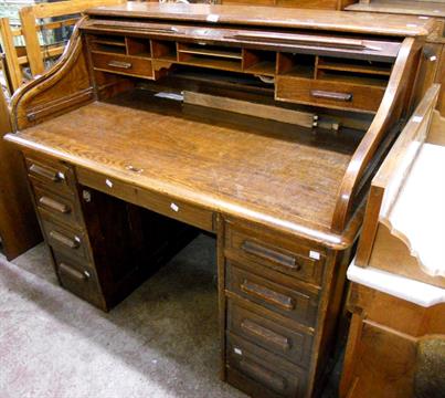 A 4 2 Early 20th Century Oak Double Pedestal Roll Top Desk With