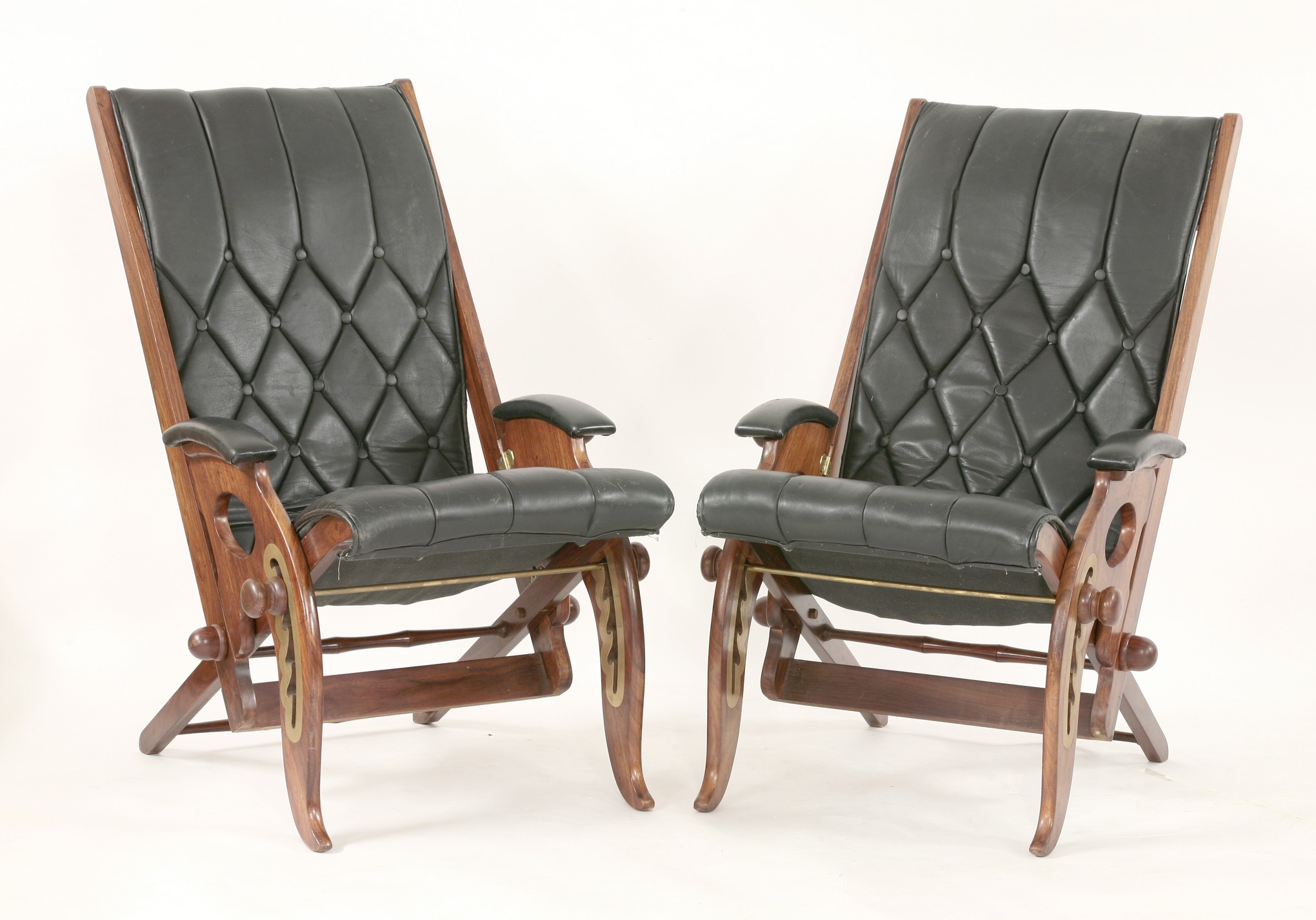 A pair of modern campaign chairs, after the original design by Herbert